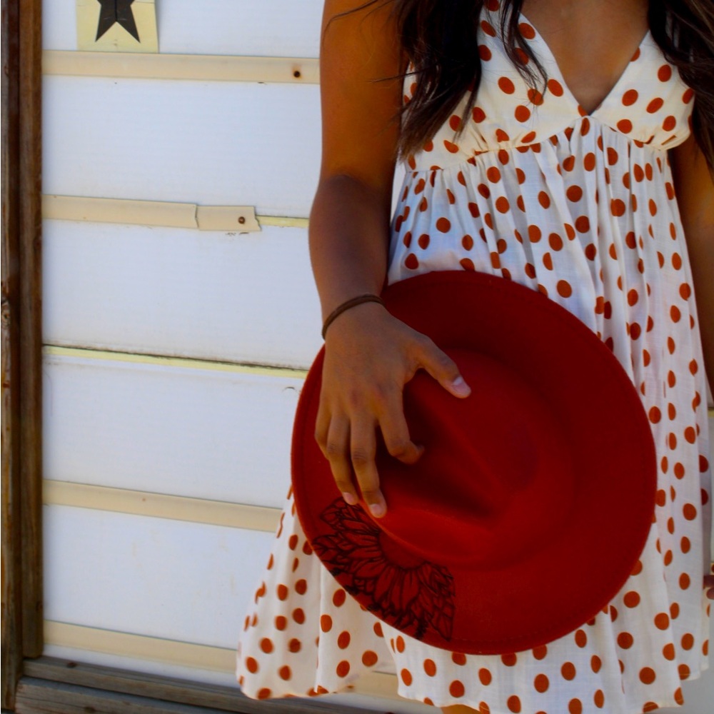 New hand burnt sunflower hat from our boutique!!